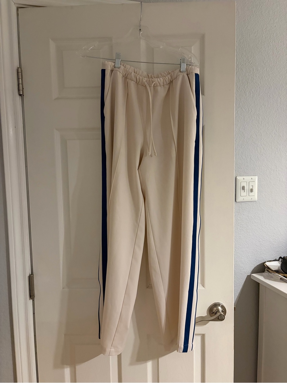Athleta Cream Track Pants with Navy Side Stripe